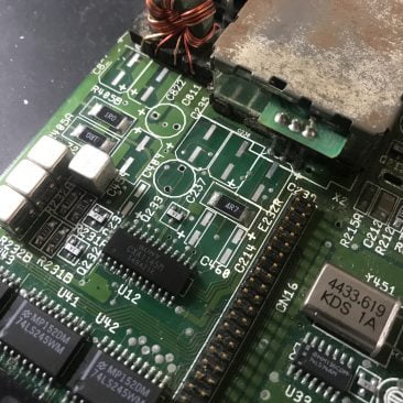 Amiga 600 mainboard with capacitors removed